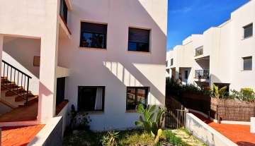 Resa Estates Ibiza Cala Tarida first line 3 bedrooms side exterior.jpg